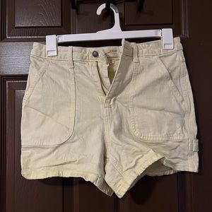 pastel yellow carpenter shorts